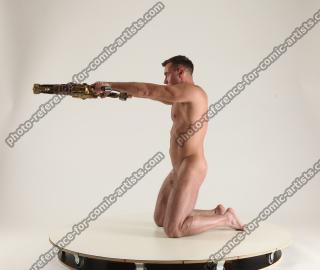 2020 01 MICHAEL NAKED MAN KNEELING POSE WITH GUNS (8)